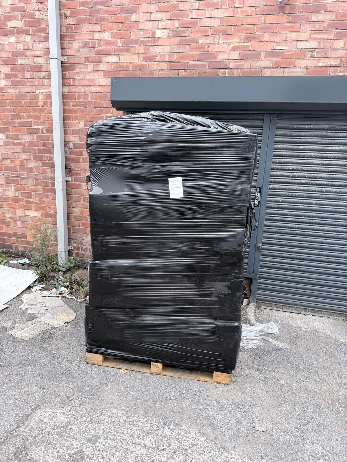 Shrink-wrapped pallet ready for UK wholesale delivery