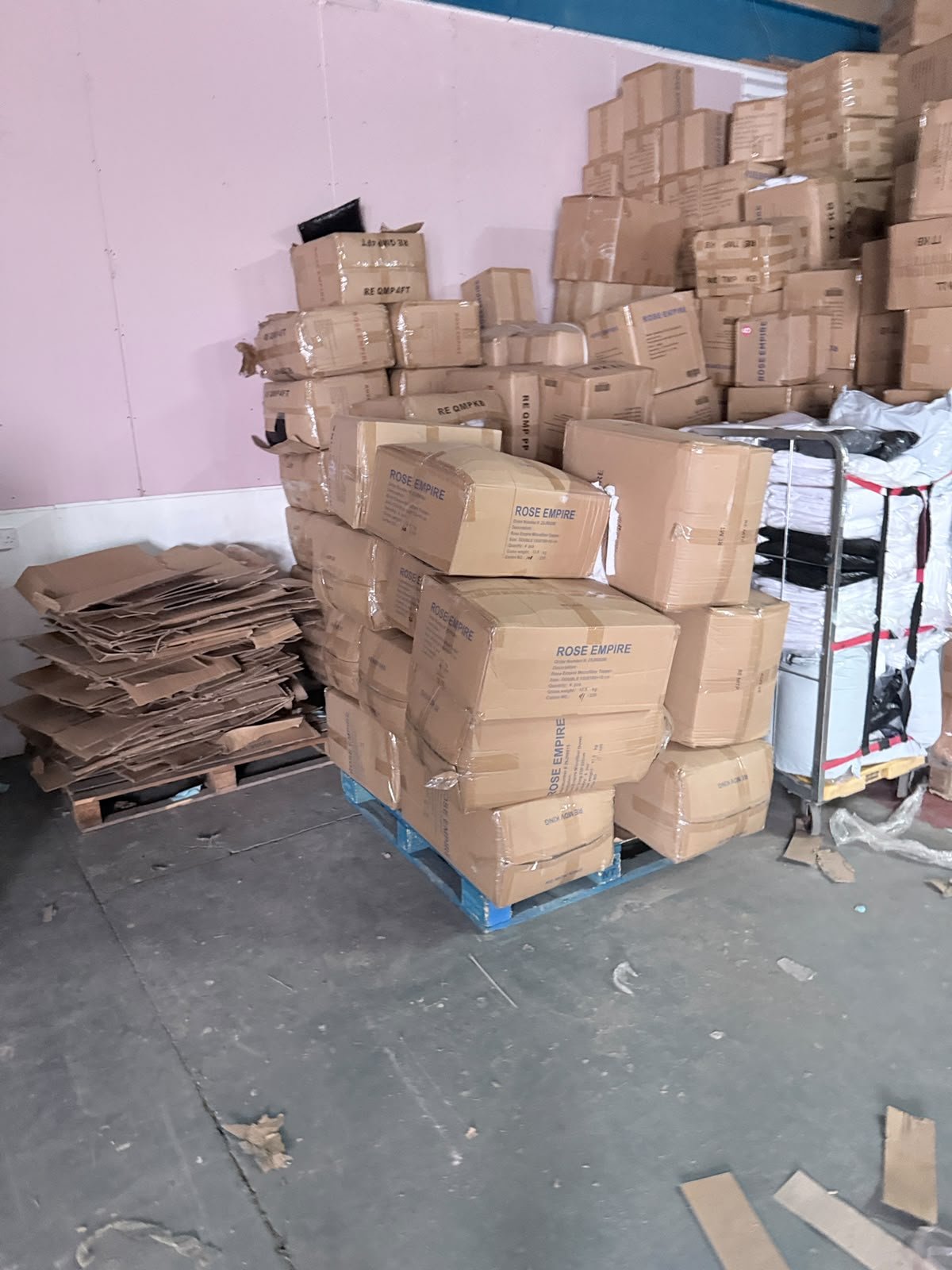 Rose Empire branded wholesale boxes on pallet in Manchester warehouse